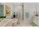 Bright bathroom with free-standing tub and double vanity at 2607 Lafayette Ave, Winter Park, FL 32789