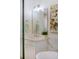 Stylish bathroom boasts a large mirror, decorative light fixture, and neutral color palette at 2607 Lafayette Ave, Winter Park, FL 32789