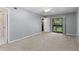 Bedroom with sliding glass doors at 2636 Crown Ct, Kissimmee, FL 34741
