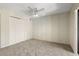 Bedroom with wallpaper and closet at 2636 Crown Ct, Kissimmee, FL 34741