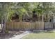 Charming townhome with a fenced-in yard and mature trees offering shade and privacy at 2636 Crown Ct, Kissimmee, FL 34741