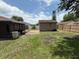 Back yard featuring a storage shed and a wooden privacy fence at 2842 Blind Owl Dr, Orlando, FL 32822