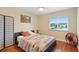 Cozy bedroom features a ceiling fan and window providing natural light at 2871 Milstead St, Orlando, FL 32837