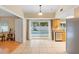 Bright dining room features tile floors, access to the kitchen and pool area at 2871 Milstead St, Orlando, FL 32837
