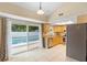 Bright kitchen features wood cabinets and stainless steel appliances at 2871 Milstead St, Orlando, FL 32837