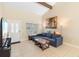 Open concept living room features tile flooring, neutral paint, and plenty of natural light at 2871 Milstead St, Orlando, FL 32837