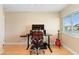 Office space with laminate wood flooring, natural light, and a modern workspace setup at 2871 Milstead St, Orlando, FL 32837