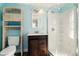 Bathroom featuring a glass shower and a wood cabinet vanity at 318 Palm St, New Smyrna Beach, FL 32168