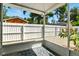 The screened patio offers a private and relaxing space with views of the fenced yard at 318 Palm St, New Smyrna Beach, FL 32168
