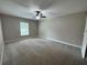 Spacious bedroom with a ceiling fan and ample natural light at 358 2Nd St, Geneva, FL 32732