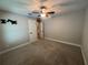 Bedroom featuring a ceiling fan, and doorway to another room at 358 2Nd St, Geneva, FL 32732