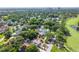 Charming home nestled among lush trees, offering a serene and private setting at 3637 Dubsdread Cir, Orlando, FL 32804