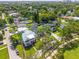 Gorgeous aerial view of newly built community with manicured lawns and mature trees at 3637 Dubsdread Cir, Orlando, FL 32804