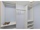 Spacious closet with built-in shelves and rods, offering ample storage solutions at 3637 Dubsdread Cir, Orlando, FL 32804