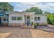 Charming single-Gathering home featuring neutral siding, stone accents, and a welcoming front entrance at 3637 Dubsdread Cir, Orlando, FL 32804
