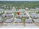 Scenic aerial view of a coastal neighborhood close to both the beach and lush green spaces at 4365 S Atlantic Ave # B8, New Smyrna Beach, FL 32169