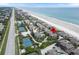 An aerial view shows the proximity to beaches, tennis courts, and other neighborhood amenities at 4365 S Atlantic Ave # B8, New Smyrna Beach, FL 32169