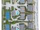 An elevated view showcases the neighborhood's charming beach houses and amenities like tennis courts at 4365 S Atlantic Ave # B8, New Smyrna Beach, FL 32169