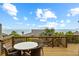 Balcony area overlooks scenic ocean view and features a table and chairs, perfect for relaxing outdoors at 4365 S Atlantic Ave # B8, New Smyrna Beach, FL 32169