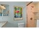 Tiled bathroom with a glass shower and modern fixtures at 4365 S Atlantic Ave # B8, New Smyrna Beach, FL 32169