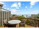 Outdoor deck with wicker furniture boasts ocean views at 4365 S Atlantic Ave # B8, New Smyrna Beach, FL 32169