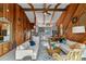 Bright and airy living space with wood paneled walls, vaulted ceilings, and an open floor plan at 4365 S Atlantic Ave # B8, New Smyrna Beach, FL 32169