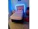 Bedrrom with neon lights, carpet flooring, bed, nightstands and basketball rug at 4624 Via Veneto Ct, Kissimmee, FL 34746