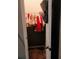 Walk-in closet offering ample storage space, complete with hanging clothes at 4624 Via Veneto Ct, Kissimmee, FL 34746