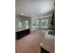 Open kitchen with granite countertops, an island, wood floors, and modern recessed lighting at 4624 Via Veneto Ct, Kissimmee, FL 34746