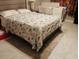 Main bedroom with modern decor, a comfortable queen-sized bed, and a stylish rug at 4624 Via Veneto Ct, Kissimmee, FL 34746