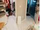 Walk-in closet providing lots of storage, leading to a bathroom with a glass shower at 4624 Via Veneto Ct, Kissimmee, FL 34746