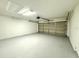 Spacious garage with epoxy flooring, and ample room for storage or parking at 468 Rio Grande Ct, Kissimmee, FL 34759