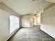 Bright and airy living room with neutral gray walls, carpet flooring, vaulted ceiling, and plenty of natural light at 468 Rio Grande Ct, Kissimmee, FL 34759