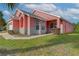 Charming one-story home featuring brick accents, lush landscaping, and a well-maintained lawn at 4700 Prairie Point Blvd, Kissimmee, FL 34746