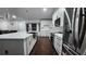 Well-designed kitchen with an island, modern appliances, and plenty of counter space at 4760 Ohio Ave, Sanford, FL 32771