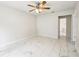 Bright bedroom featuring modern marble flooring and a ceiling fan at 478 Chicago Woods Cir, Orlando, FL 32824