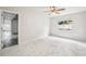 Bedroom showcasing a ceiling fan, window and tiled floors at 478 Chicago Woods Cir, Orlando, FL 32824