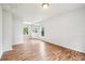 Inviting dining room with wood-look floors and natural light, perfect for Gathering meals and gatherings at 478 Chicago Woods Cir, Orlando, FL 32824
