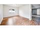 Spacious living room with hardwood floors and natural light at 478 Chicago Woods Cir, Orlando, FL 32824