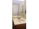 Bathroom sink with a mirror and lighting fixtures at 4830 S Conway Rd # 40, Orlando, FL 32812