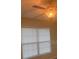 Bedroom featuring natural light from a window and a ceiling fan with a light fixture at 4830 S Conway Rd # 40, Orlando, FL 32812