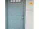 The building's blue-painted door is marked with unit number 40 at 4830 S Conway Rd # 40, Orlando, FL 32812