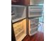 The inside of a refrigerator with adjustable glass shelves and door storage is visible at 4830 S Conway Rd # 40, Orlando, FL 32812