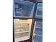The inside of a refrigerator is shown with adjustable glass shelves and storage drawers at 4830 S Conway Rd # 40, Orlando, FL 32812