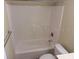 Clean white bathroom shower and tub featuring a shower head and silver fixtures at 4830 S Conway Rd # 40, Orlando, FL 32812
