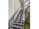 Staircase to unit features railing at 4830 S Conway Rd # 40, Orlando, FL 32812
