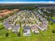 Aerial view of a residential neighborhood featuring well-maintained homes with pools in a peaceful community at 4993 Southlawn Ave, Orlando, FL 32811