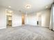 Spacious bedroom with a walk-in closet and access to a bathroom and another room at 4993 Southlawn Ave, Orlando, FL 32811