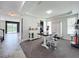 Bright dining area with modern table and chairs, open to the kitchen and living spaces at 4993 Southlawn Ave, Orlando, FL 32811