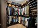 Well-organized walk-in closet with custom shelving and ample storage space at 5018 Tupelo Ct, Minneola, FL 34715